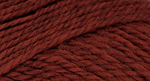 A close-up photo of a red orange sample of Nature Spun yarn