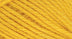 A close-up photo of a yellow sample of Nature Spun yarn