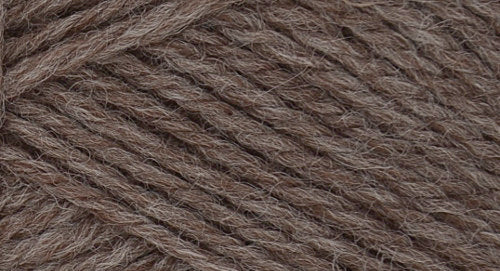 A close-up photo of a natural brown sample of Nature Spun yarn