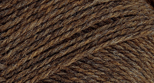 A close-up photo of a brown sample of Nature Spun yarn