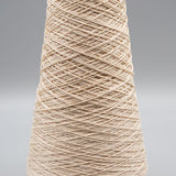 Photo of a cone of off-white mercerized cotton 10/2 yarn