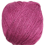 A skein of Universal Bamboo Pop yarn - True Red 137