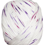 A photo of a ball of white with pink and purple dots of Bamboo Pop - 306