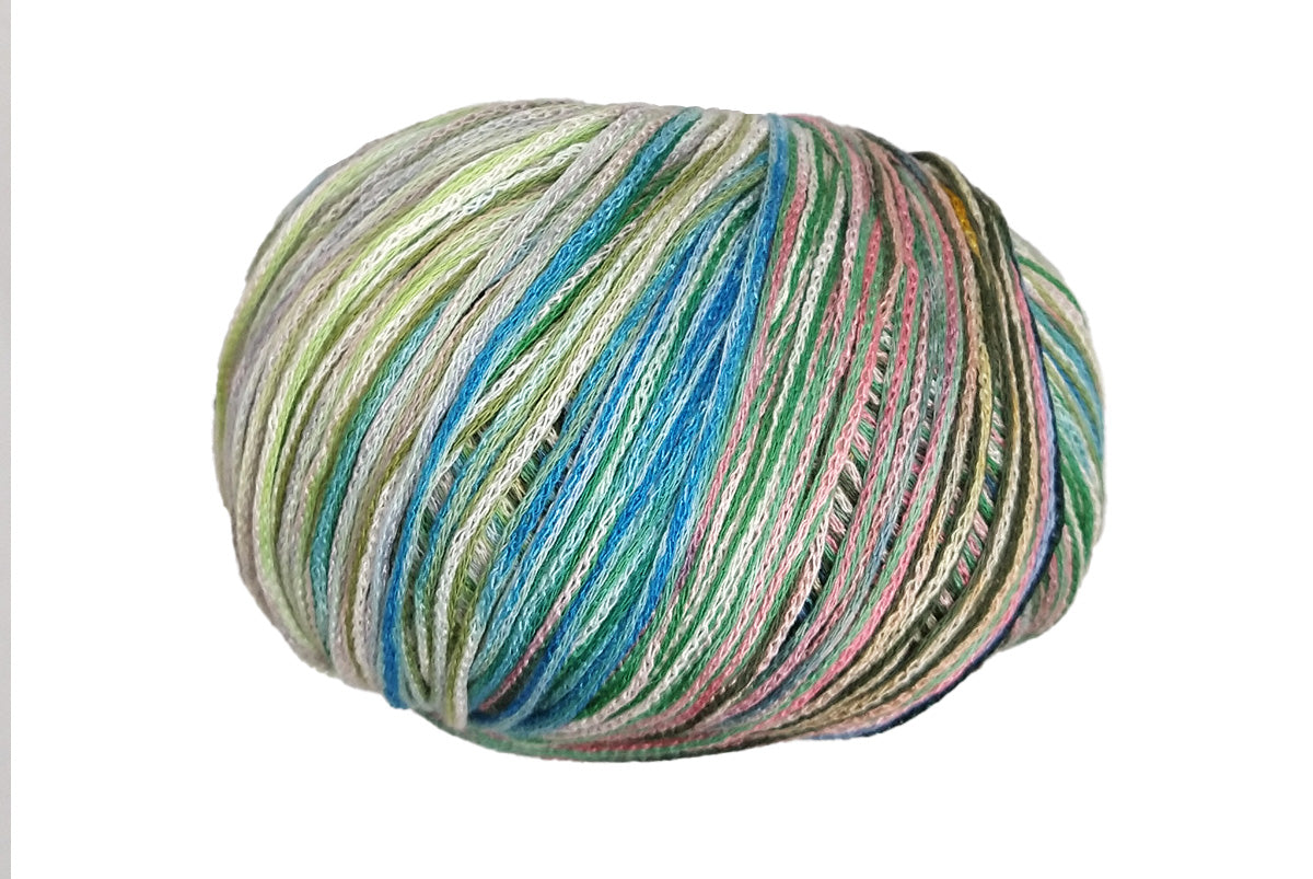 A photo of a pink, green, and blue Cairns yarn