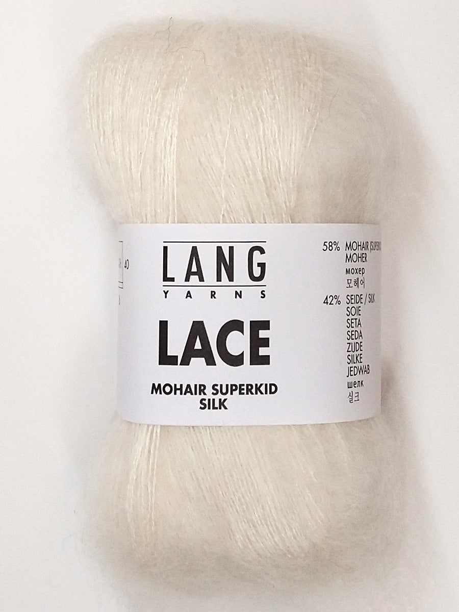 A photo of a cream skein of Lang Lace yarn.