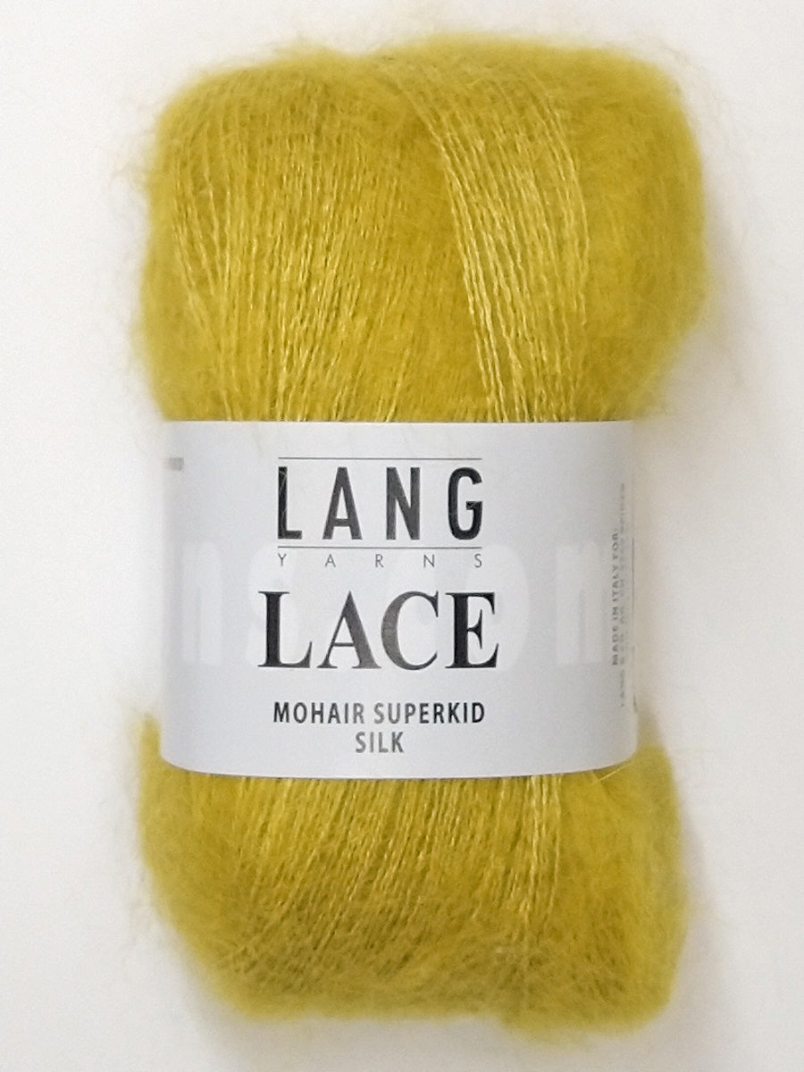 A photo of a golden skein of Lang Lace yarn.