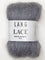 A photo of a silver lining skein of Lang Lace yarn.