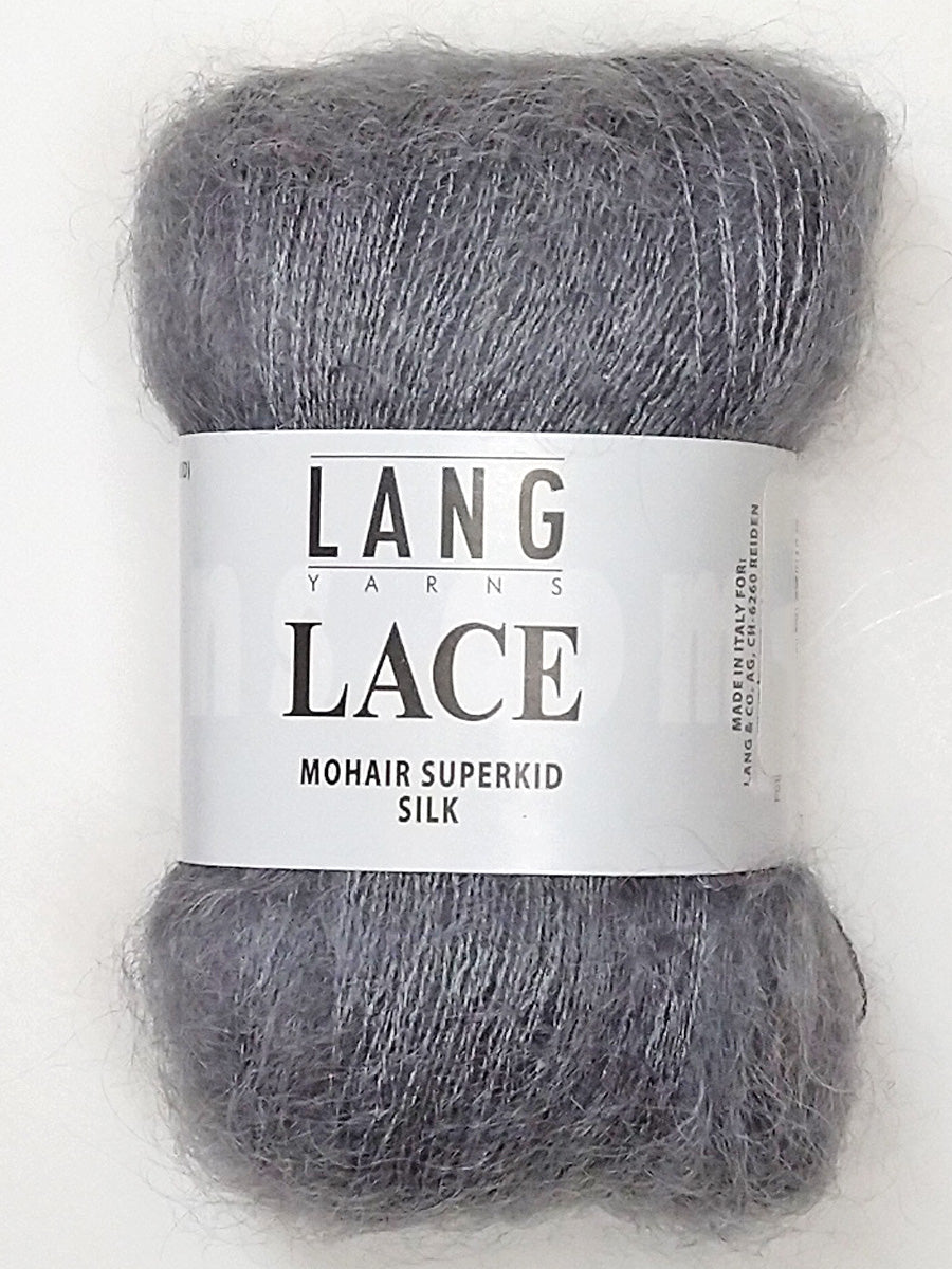A photo of a silver lining skein of Lang Lace yarn.
