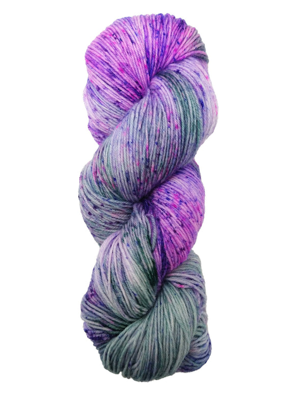 Hank of the colorway Boswell- variegated purple and light green with speckles of dark purple and hot pink