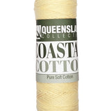 A photo of a skein of butter Coastal Cotton Cotton Yarn