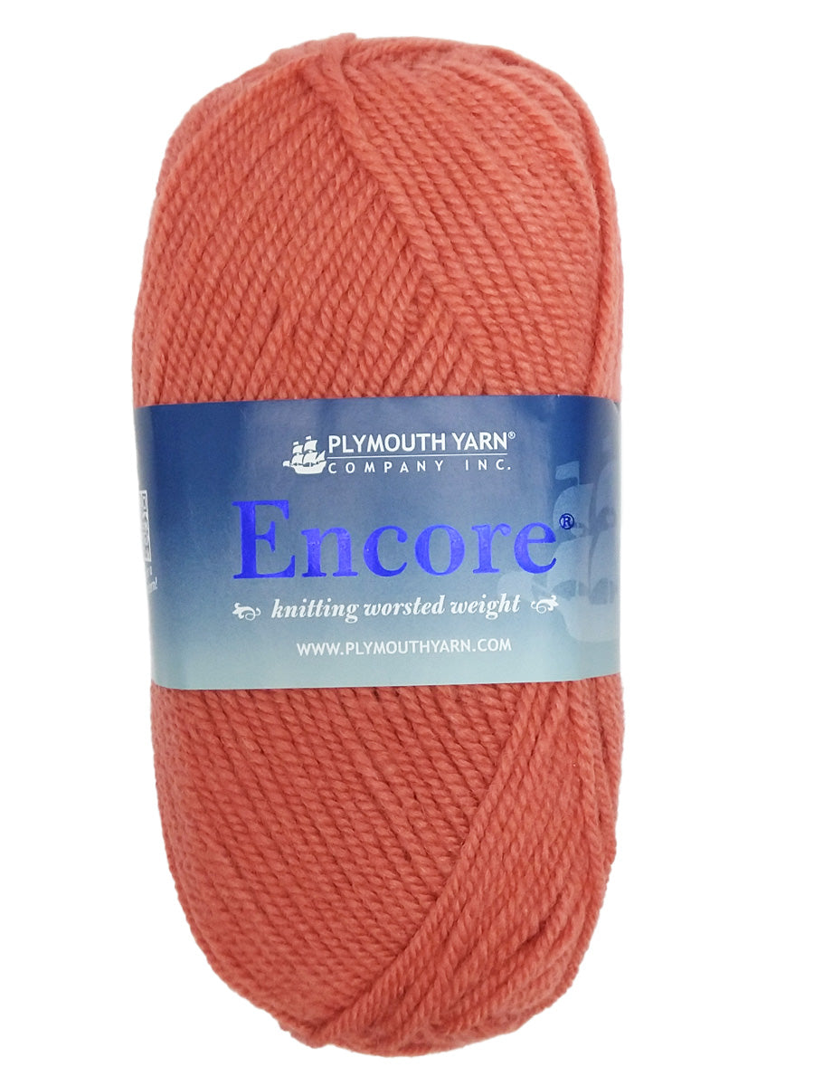 Photo of a coral colored skein of Encore Plymouth Yarn