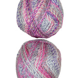 A colorful photo of two balls of James C. Brett Marble Chunky yarn