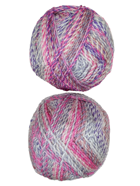 A colorful photo of two balls of James C. Brett Marble Chunky yarn