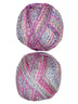 A colorful photo of two balls of James C. Brett Marble Chunky yarn