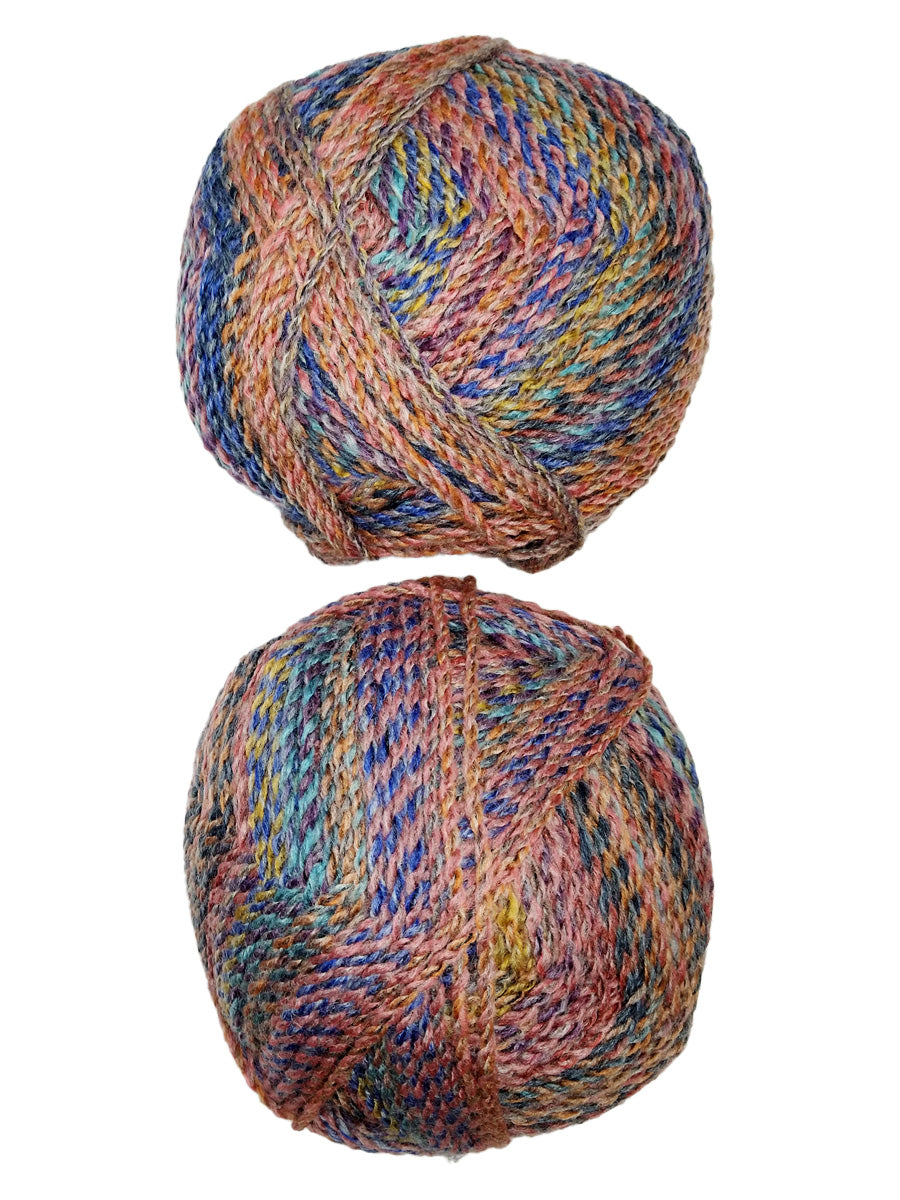 A photo of two colorful balls of Marble Chunky yarn.