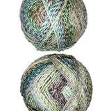 A photo of two colorful balls of Marble Chunky yarn.