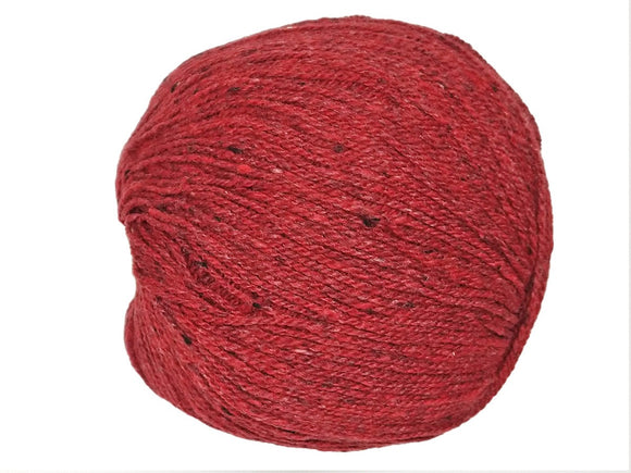 A bright red skein of Queensland Collection Kathmandu yarn