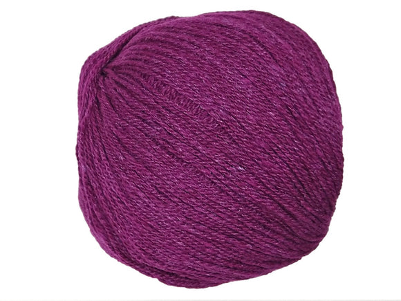 A fuschia skein of Queensland Collection Kathmandu yarn