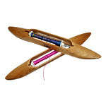 Photo of two cherry 15" Schacht Spindle Co. shuttle boats, open bottom