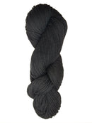 A black skein of Brown Sheep Prairie Spun DK yarn