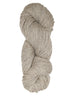 A natural oatmeal colored hank of Prairie Spun yarn