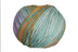 A photo of a purple, teal, and ornage Cairns yarn