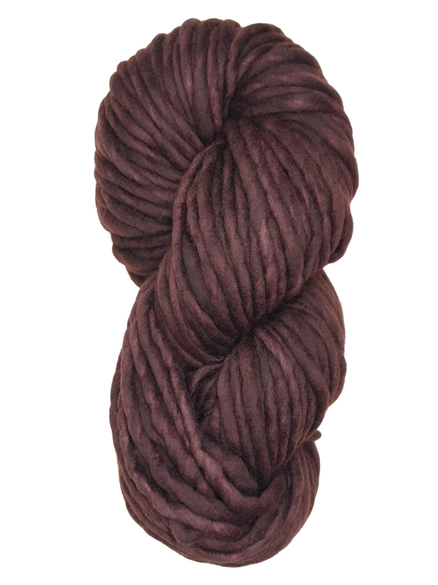 A dark brown skein of Malabrigo Rasta yarn