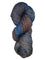 A colorful skein of blue and brown Malabrigo Rios yarn