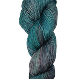A colorful skein of teal and brown Malabrigo Rios yarn