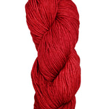 A colorful skein of red Malabrigo Rios yarn