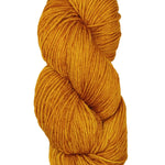 A colorful skein of yellowish orange Malabrigo Rios yarn