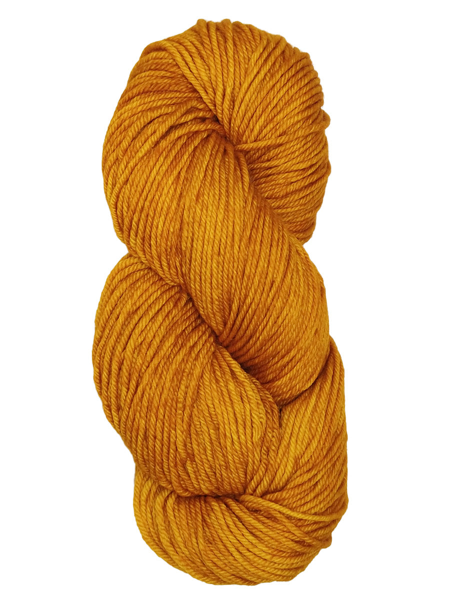 A colorful skein of yellowish orange Malabrigo Rios yarn