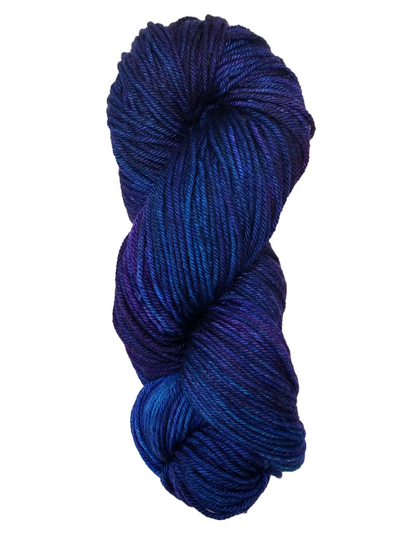 A colorful skein of blue and purple Malabrigo Rios yarn