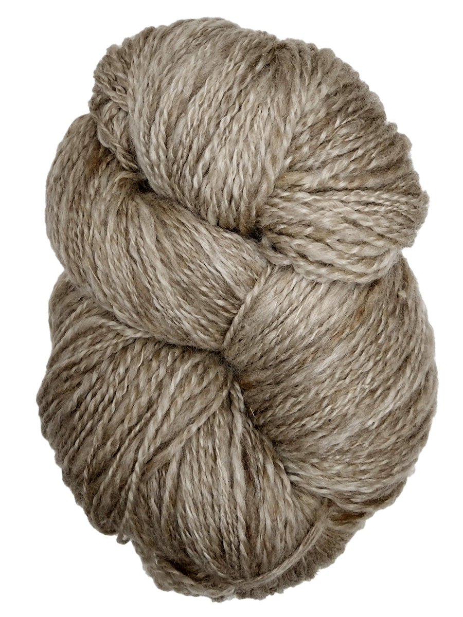 Photo of a white/tan hank of natural yarn