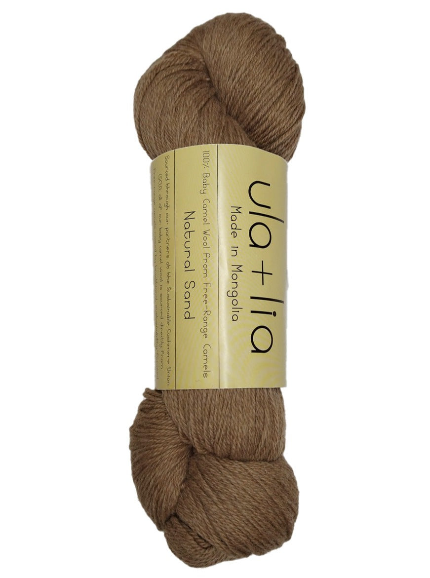 A photo of a hank of light brown Ula and Lia camel wool yarn