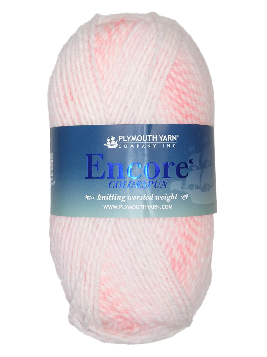 A pastel pink white mix skein of Plymouth Encore Colorspun yarn