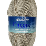 a grey mix skein of Plymouth Encore Colorspun yarn