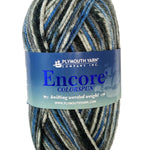 A blue taupe grey mix skein of Plymouth Encore Colorspun yarn
