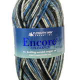 A blue taupe grey mix skein of Plymouth Encore Colorspun yarn