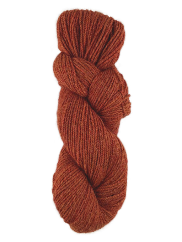 Skein of alpaca yarn color rust orange