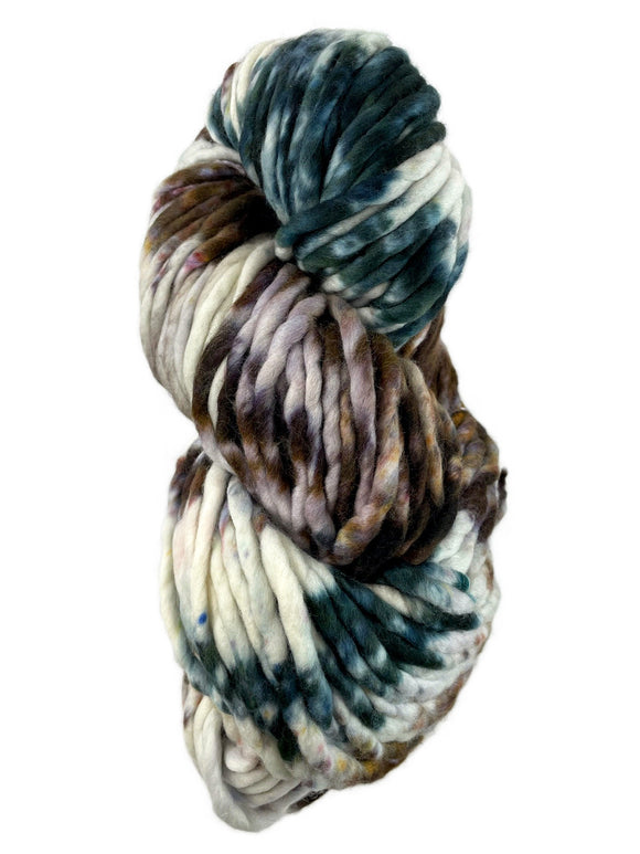 A white brown and green skein of Malabrigo Rasta yarn