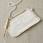 Cocoknits Colorful Ring Stitch Markers on demo swatch