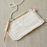 Cocoknits Colorful Ring Stitch Markers on demo swatch