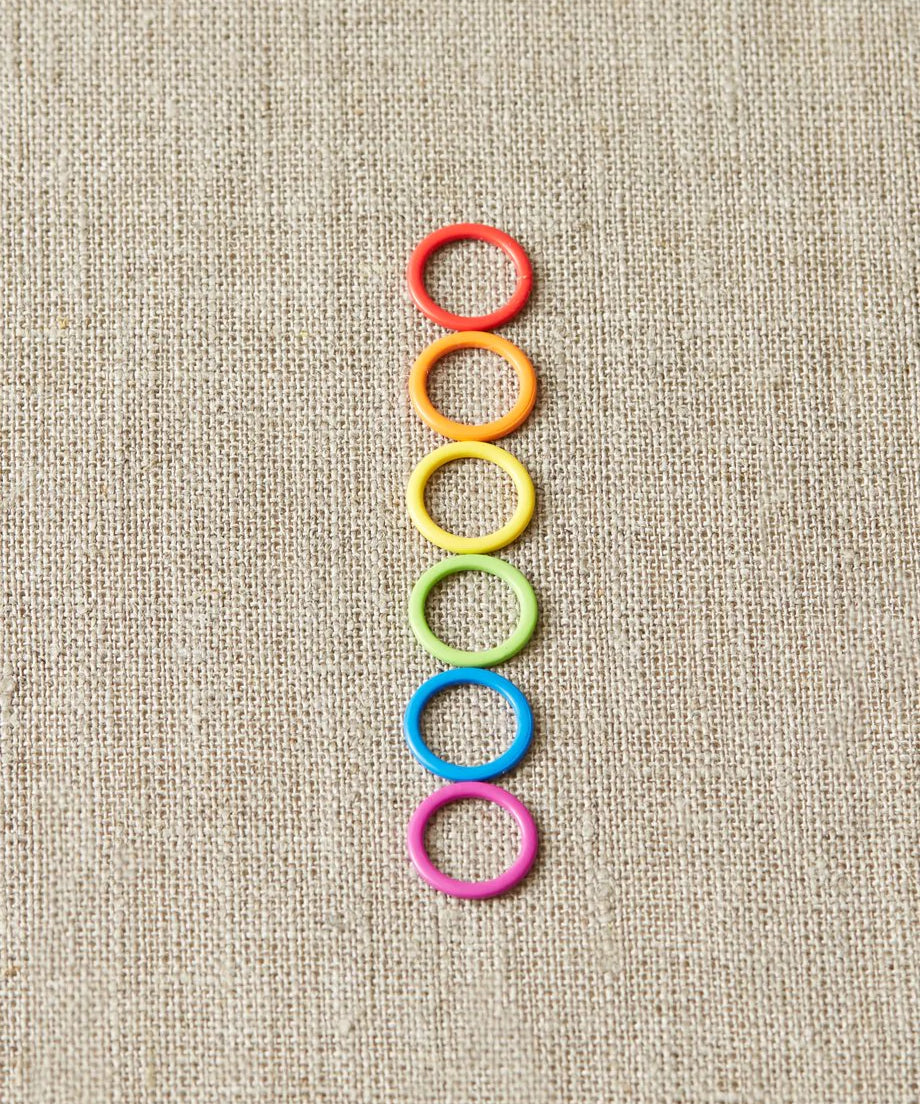 Cocoknits Colorful Ring Stitch Markers on linen background