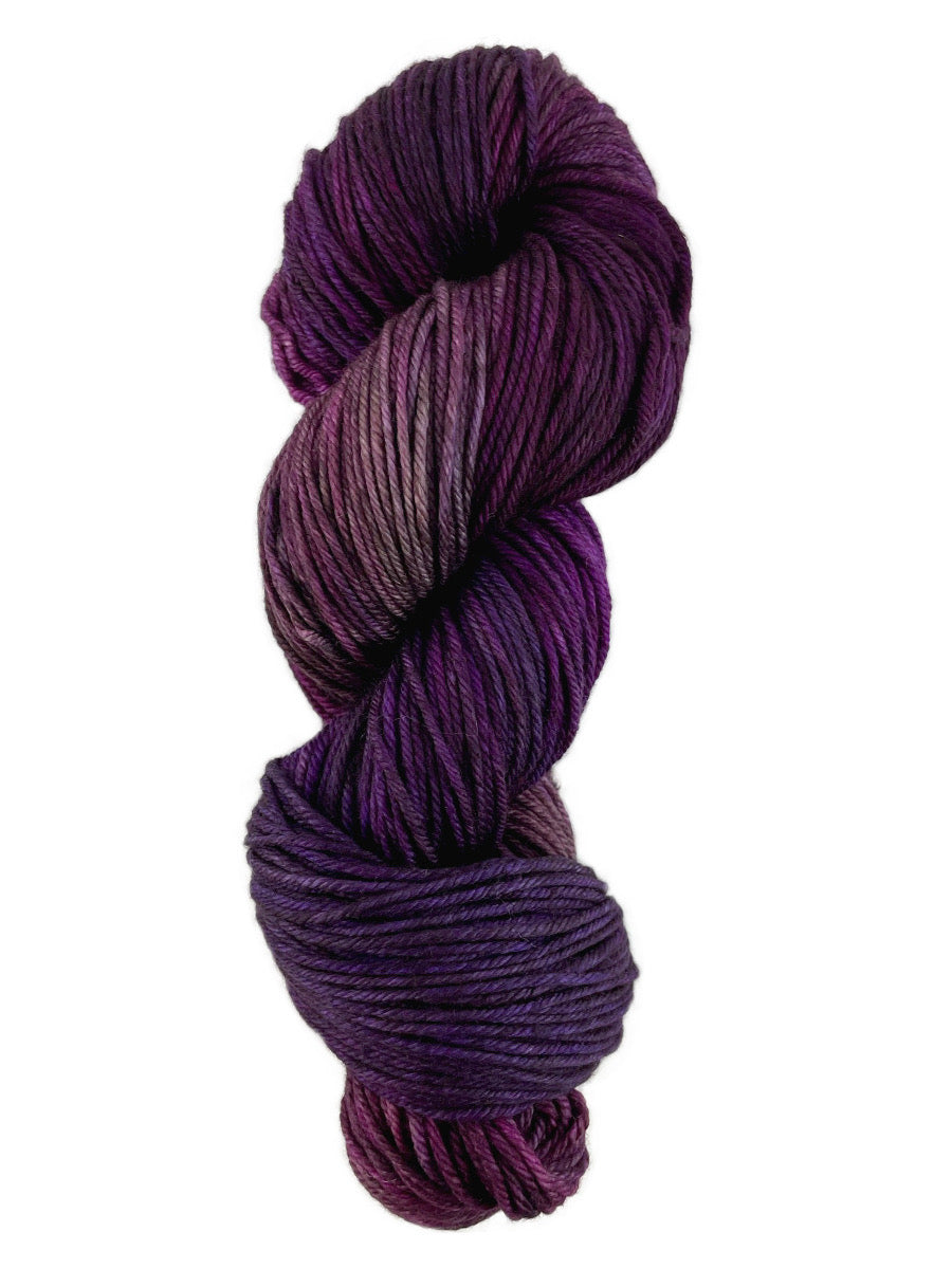 A colorful skein of purple Malabrigo Rios yarn