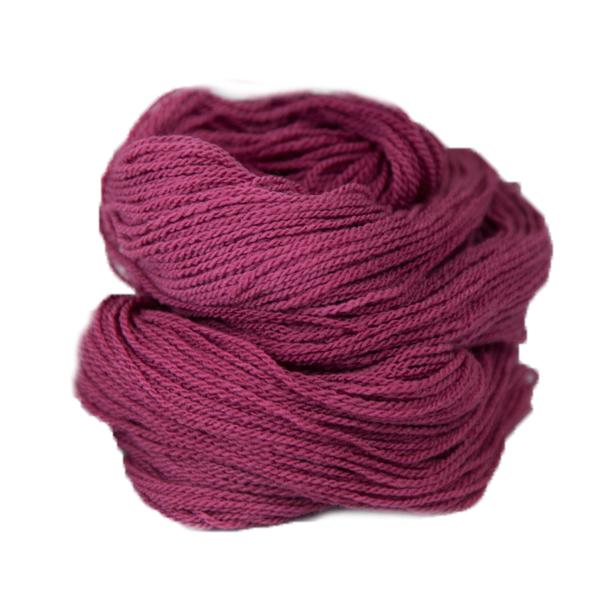 A pink hank of the Mountain Meadow Wool Saratoga yarn collection