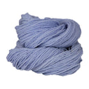 A cloud blue hank of the Mountain Meadow Wool Saratoga yarn collection