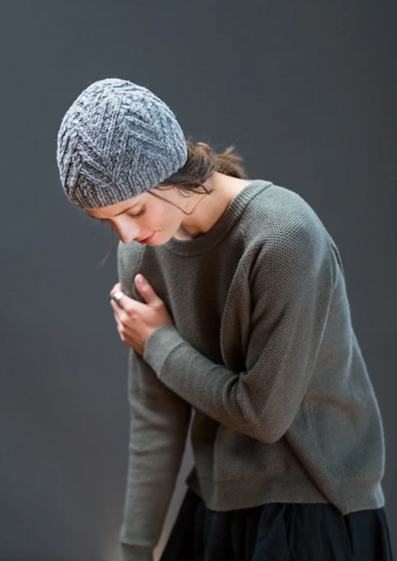 A woman wearing a knitted hat