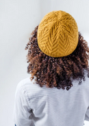 A woman wearing a knitted hat