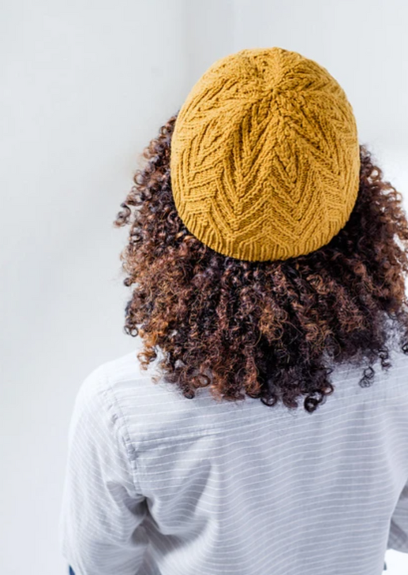 A woman wearing a knitted hat